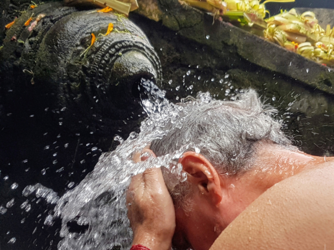 Ritual washing at the Tirta Empul temple in Bali, Indonesia
