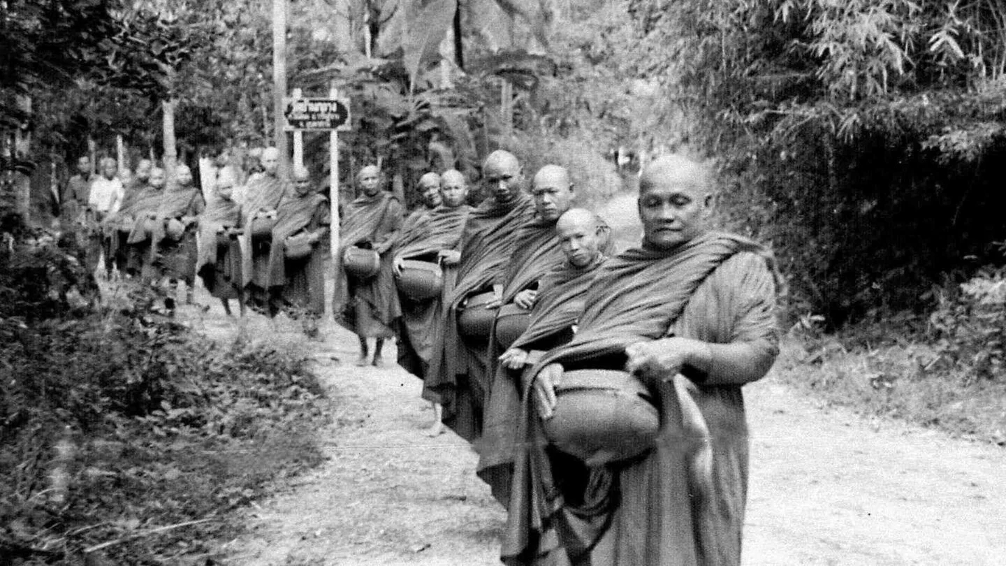 Ajahn Chah and monks on alms round