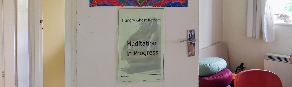 Poster on door reads "Meditation in Progress"